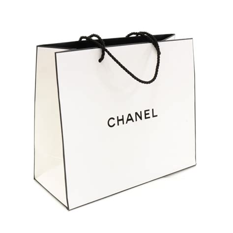 off a white chanel bag|White Chanel shopping bag.